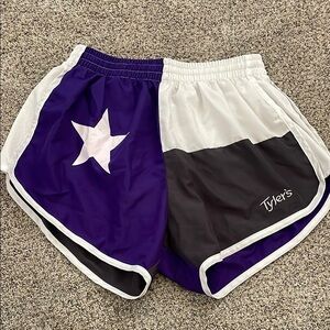 Tyler’s Texas flag shorts purple
